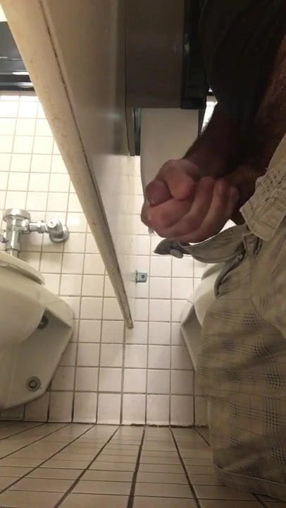 Understall jerkoff and cum