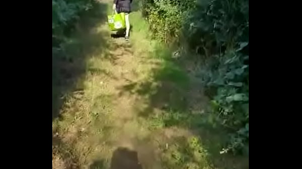 gay crossdresser takes a walk in public dressed up like a girl but soon runs away when he hears two people near by