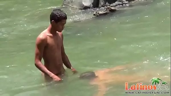 Latin gay boy pops a boner for his mate outdoors