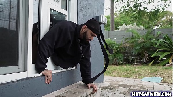 He surprised the thief jerking off before getting stuck in the window – gay porn